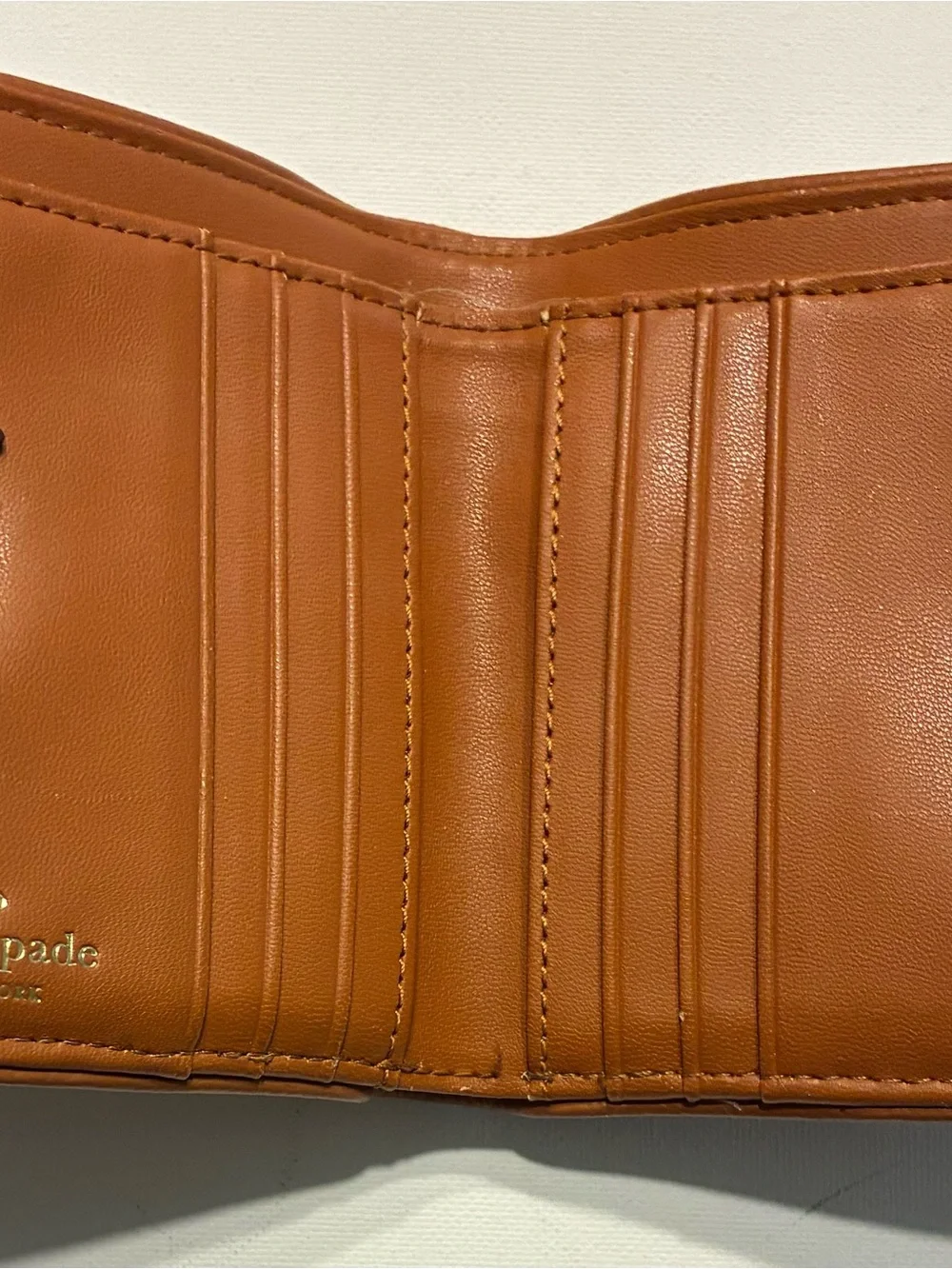 Kate Spade New York EUC Leila Slim Bifold Tan Leather Wallet